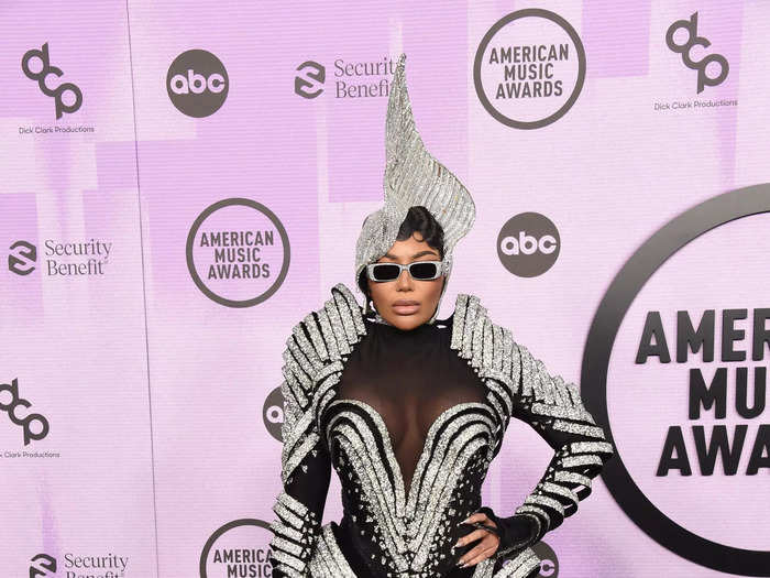 Dencia wore a sheer and silver bodysuit with a matching headpiece and a sparkly cane.