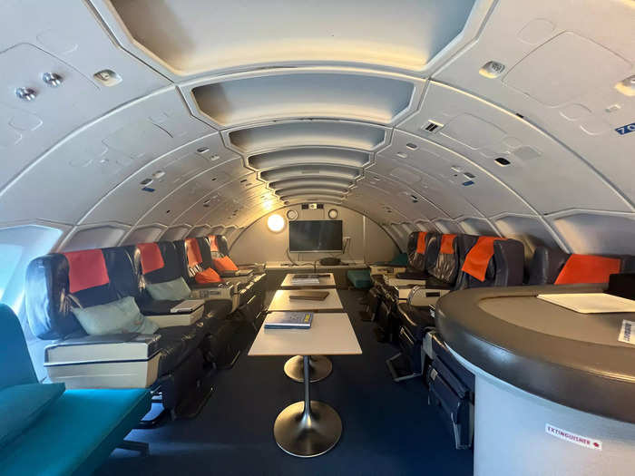 In addition to rooms, the mammoth 747 boasts a conference room with the original first-class seats…