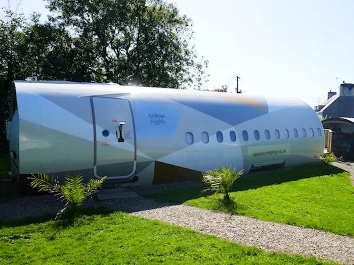 In Pembrokeshire, England, guests can stay in a retired Etihad Airways A319 aircraft. Dubbed the "Arabian Nights Airbus," the plane has been stripped of its flight controls with just the fuselage still standing.