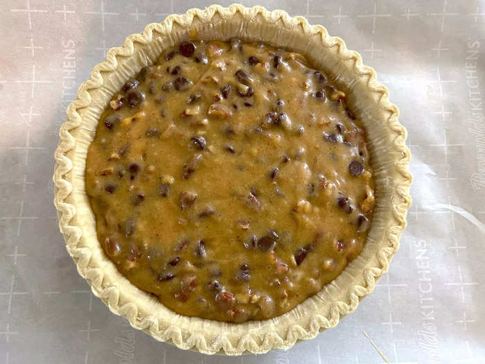 I placed my pie crust on a sheet pan lined with parchment paper and poured in the filling.