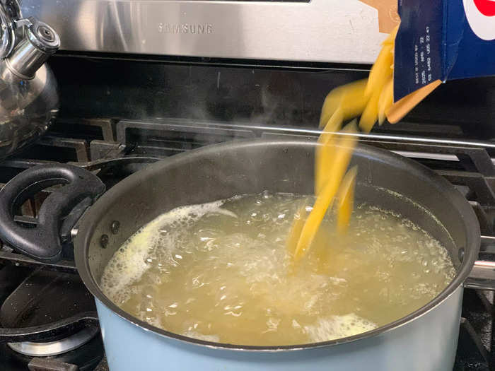 First, I boiled my pasta in chicken bouillon broth.