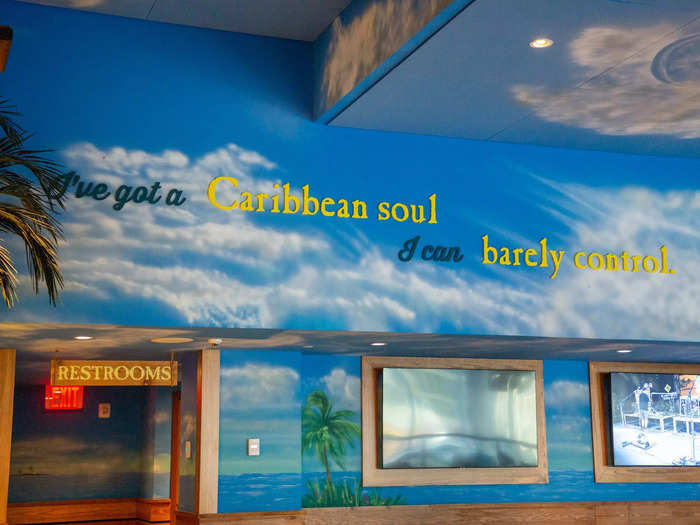 … nautical decor, Buffett lyrics on the walls …