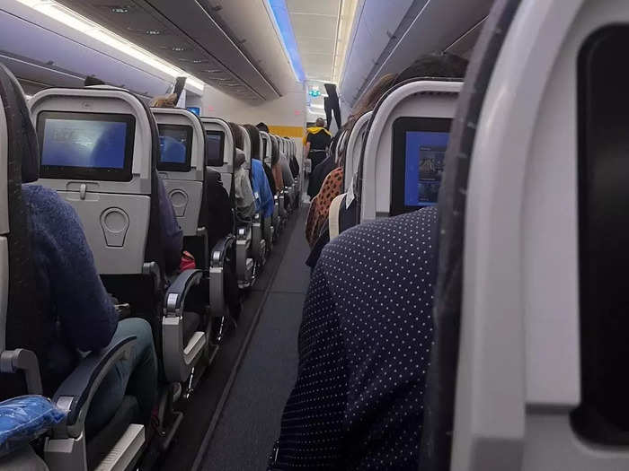 About an hour into the flight, I realized I was more uncomfortable than I usually was on international flights. The space between the seats and the aisles seemed narrower than other aircrafts I had flown on.