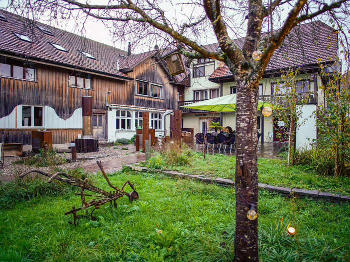 The entire property is located inside a garden behind a huge house where 17 full-time residents live, the host, Maria, told me.