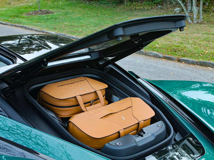 The Battista does offer a teeny tiny storage area, though, and custom luggage to match.