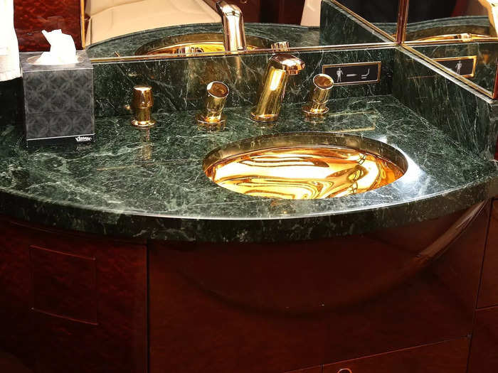 The former president also has a master bathroom with a green countertop and gold-plated sink...