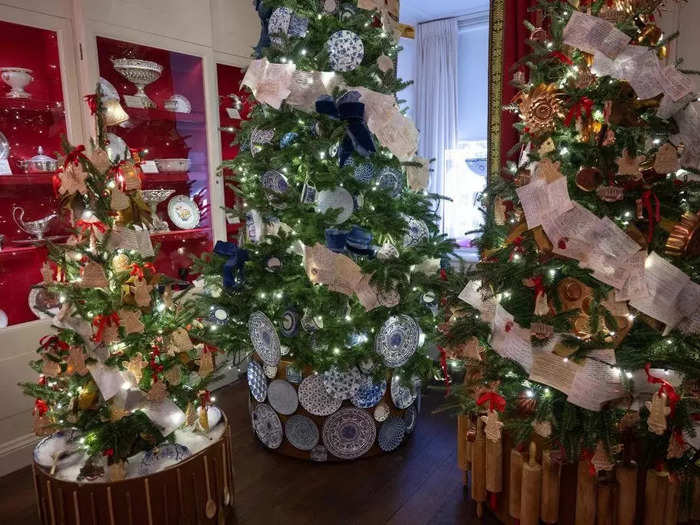 Trees in the China Room are decorated with recipe cards contributed by volunteers.