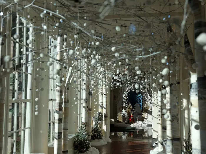 Wintery trees and white lanterns line the East Colonnade.