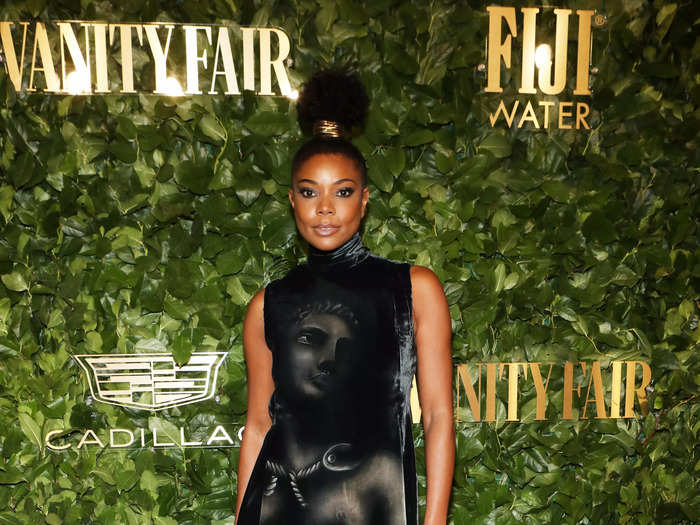 Gabrielle Union walked the red carpet in a black sleeveless Fendi dress that had a classical sculpture printed on the front.