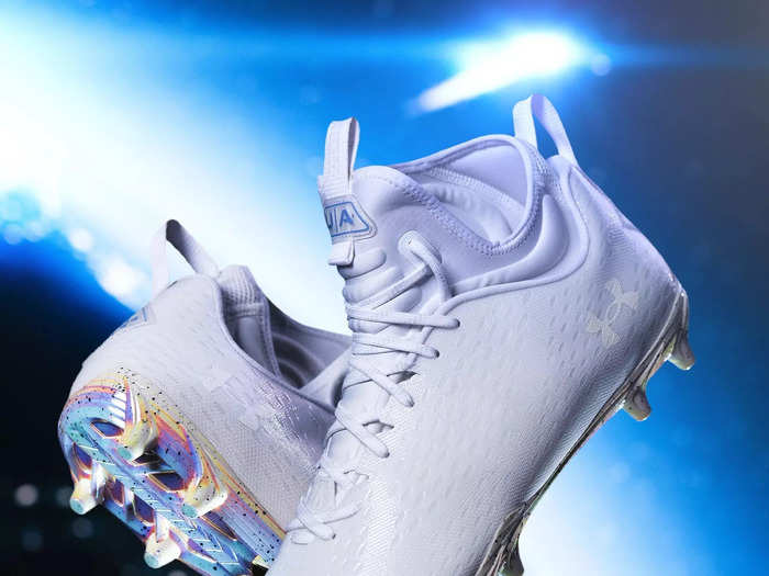 The Under Armour shoes mimic the white moon boots with dots representing stars.