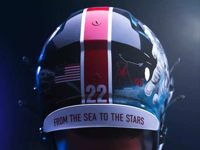 The back of the helmet includes the motto, "From the sea to the stars."