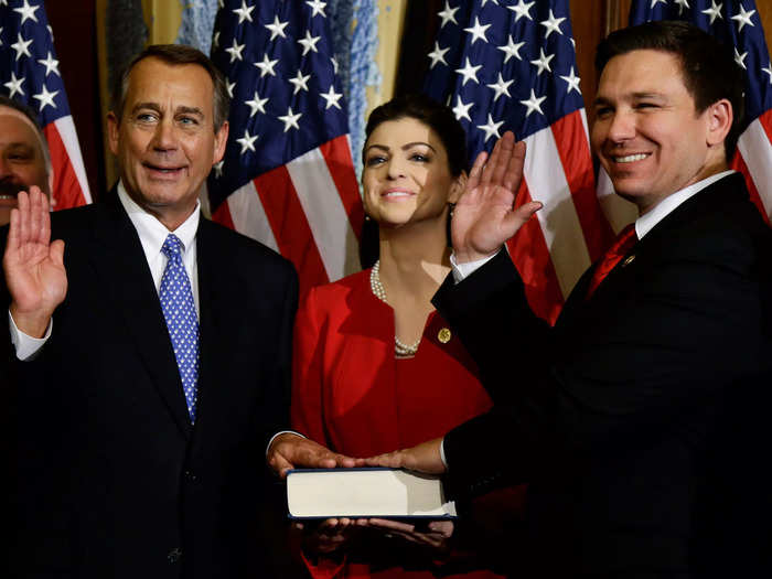 January 2013: Casey held the Bible as DeSantis was sworn into the House of Representatives.