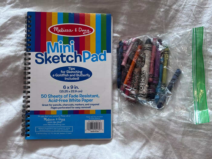 A mini sketchpad and crayons provided my son with endless entertainment.