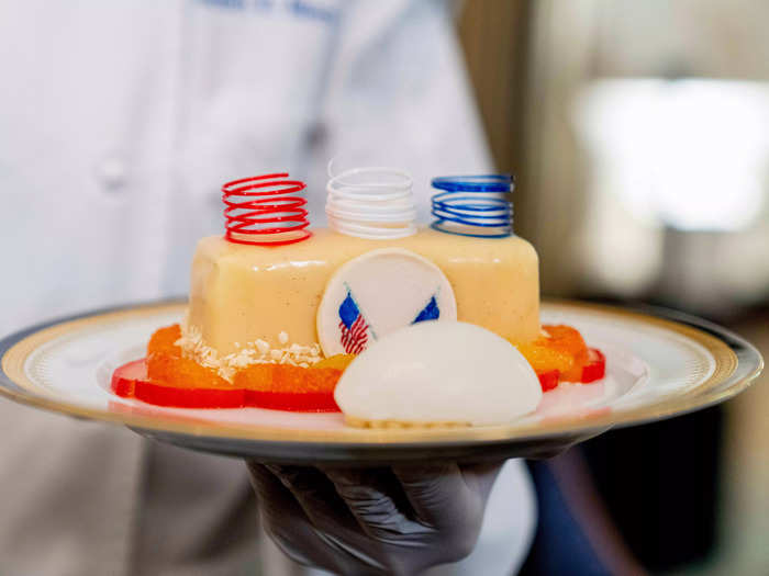 For dessert, White House pastry chef Susie Morrison presented an orange chiffon cake decorated with the theme colors.