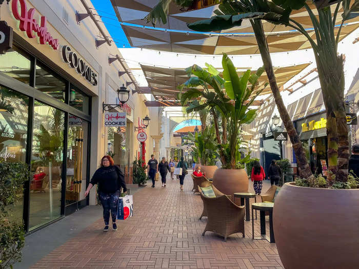 When I arrived at the palm tree-lined Irvine Spectrum Center shortly before 8:30 a.m., I was greeted by a stream of cars scouring open parking spots.