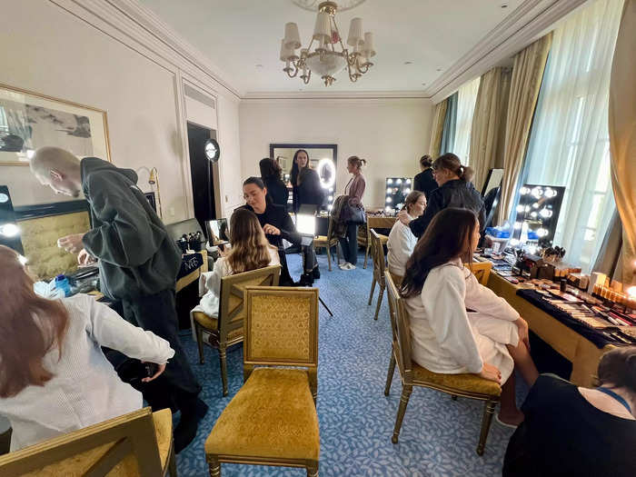 The debutantes are given a glimpse of how their makeup will look on the evening of the ball.