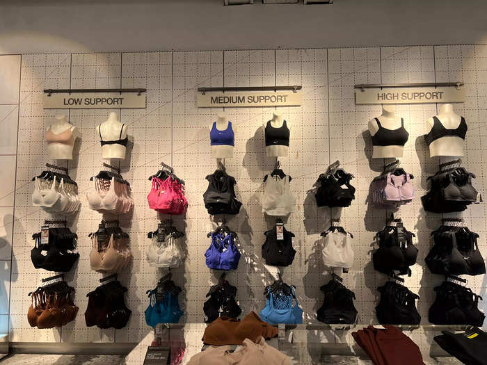 Nike has far more sports bra selections and they are displayed in a more spread-out fashion, really utilizing the space.