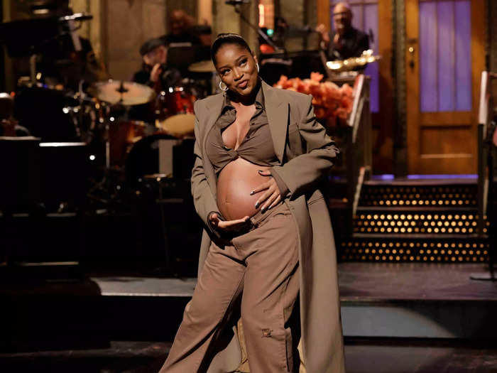 On December 3, Palmer showed off her baby bump during the opening monologue on "SNL."