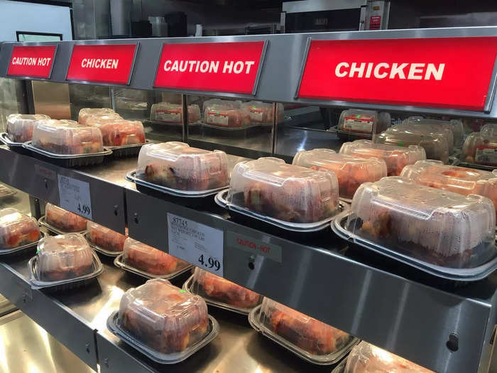 The famous $4.99 Costco rotisserie chicken is placed in a strategic spot.