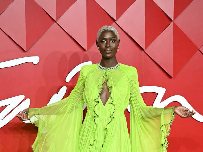 Jodie Turner-Smith wore a bright-green, Gucci gown that had pleated fabric flowing from the sleeves and skirt.