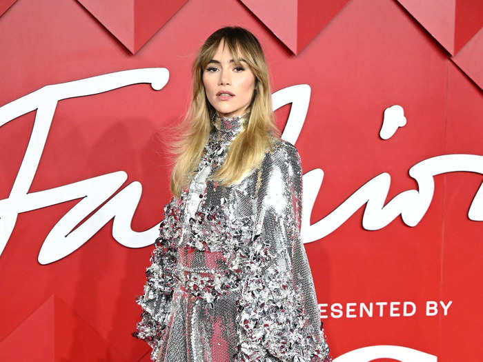 Suki Waterhouse looked like a knight in a shiny, tea-length Alexander Vauthier gown that had flowing sleeves. She wore the piece with coordinating boots.