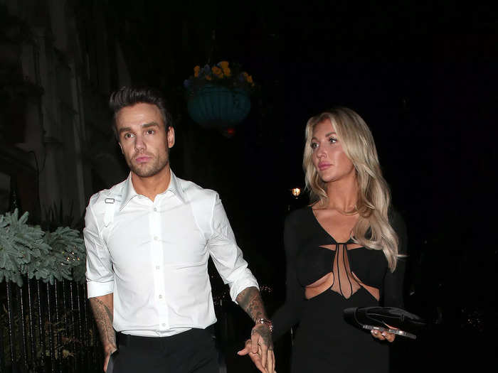 Former "One Direction" star Liam Payne kept it simple with a white shirt and black pants, while Kate Cassidy wore a black dress with a thigh-high slit.