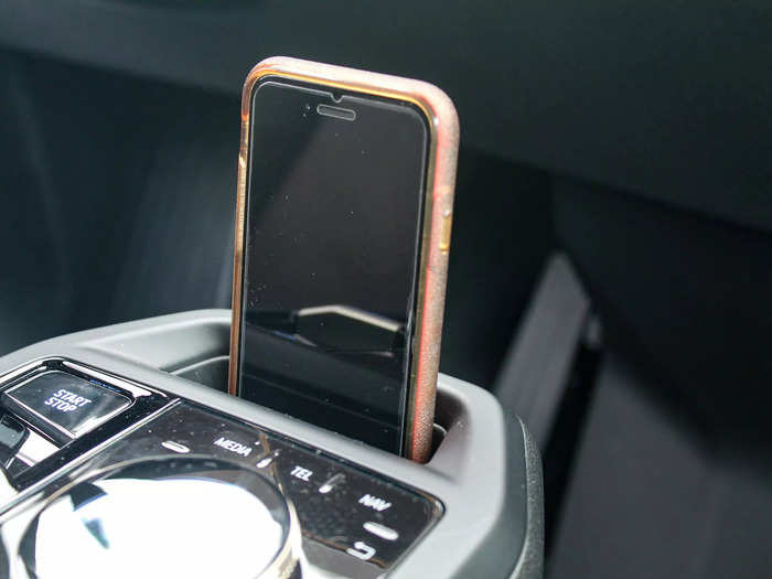 A thoughtful slot at the end of the center console perfectly fits a smartphone.