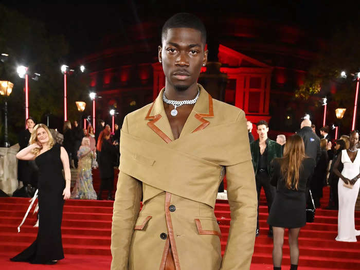 Victor Kunda opted for a statement coat at the awards show.