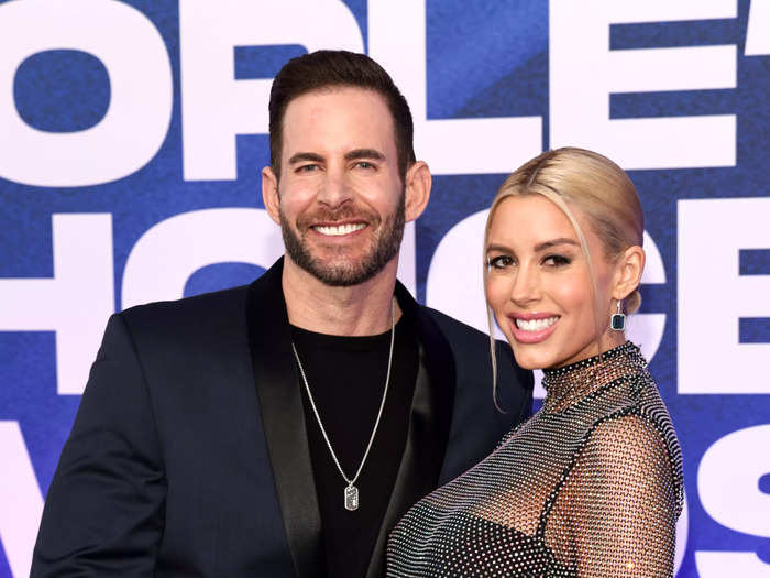 "Selling Sunset" star Heather Rae El Moussa showed off her growing baby bump as she posed alongside her husband Tarek El Moussa.