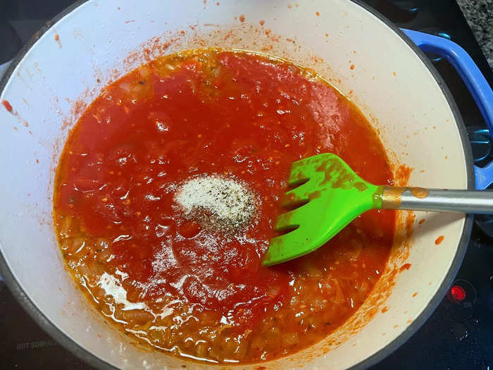 I seasoned the sauce with salt and pepper and then covered my pot.