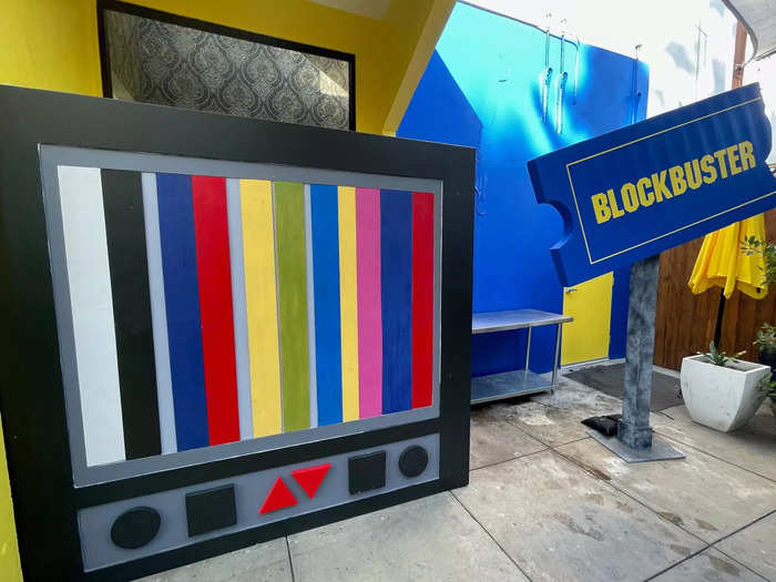 Other colorful Blockbuster signs were propped in the outside dining area.