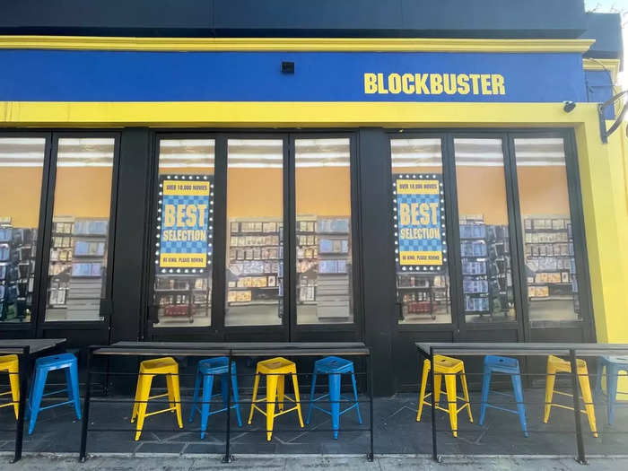 Walking up, I immediately noticed the emblematic yellow and blue adorning the exterior walls, along with matching chairs. If I didn