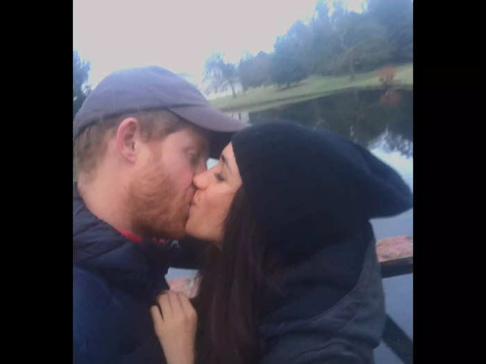 In one photo, the couple share a kiss in front of a pond in Windsor.