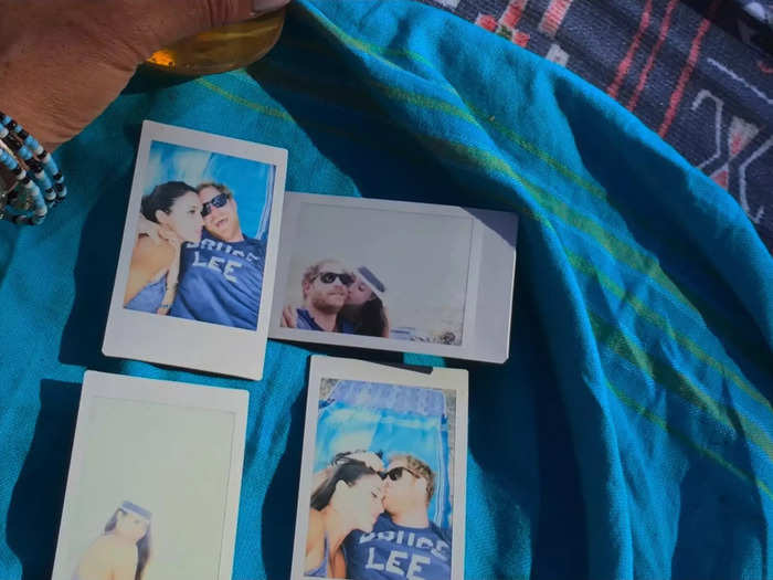 The couple also shared Polaroid photos from the vacation, which included one of Meghan kissing Harry on the cheek.