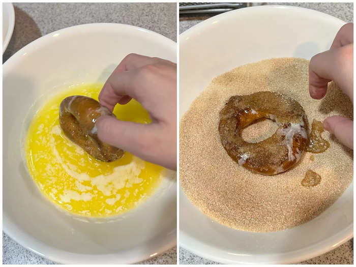 To get the cinnamon sugar sticking to the doughnuts, the recipe told me to dunk the doughnuts in butter, and then coat them in cinnamon sugar.