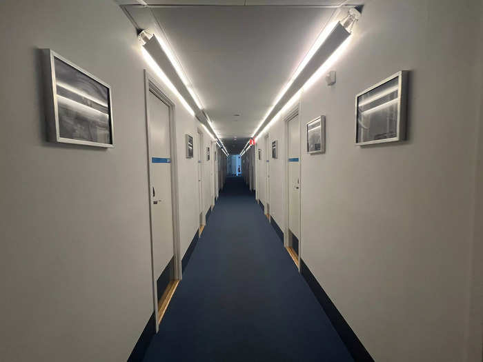 To the right of the lobby is a long hallway covering the full length of the fuselage.