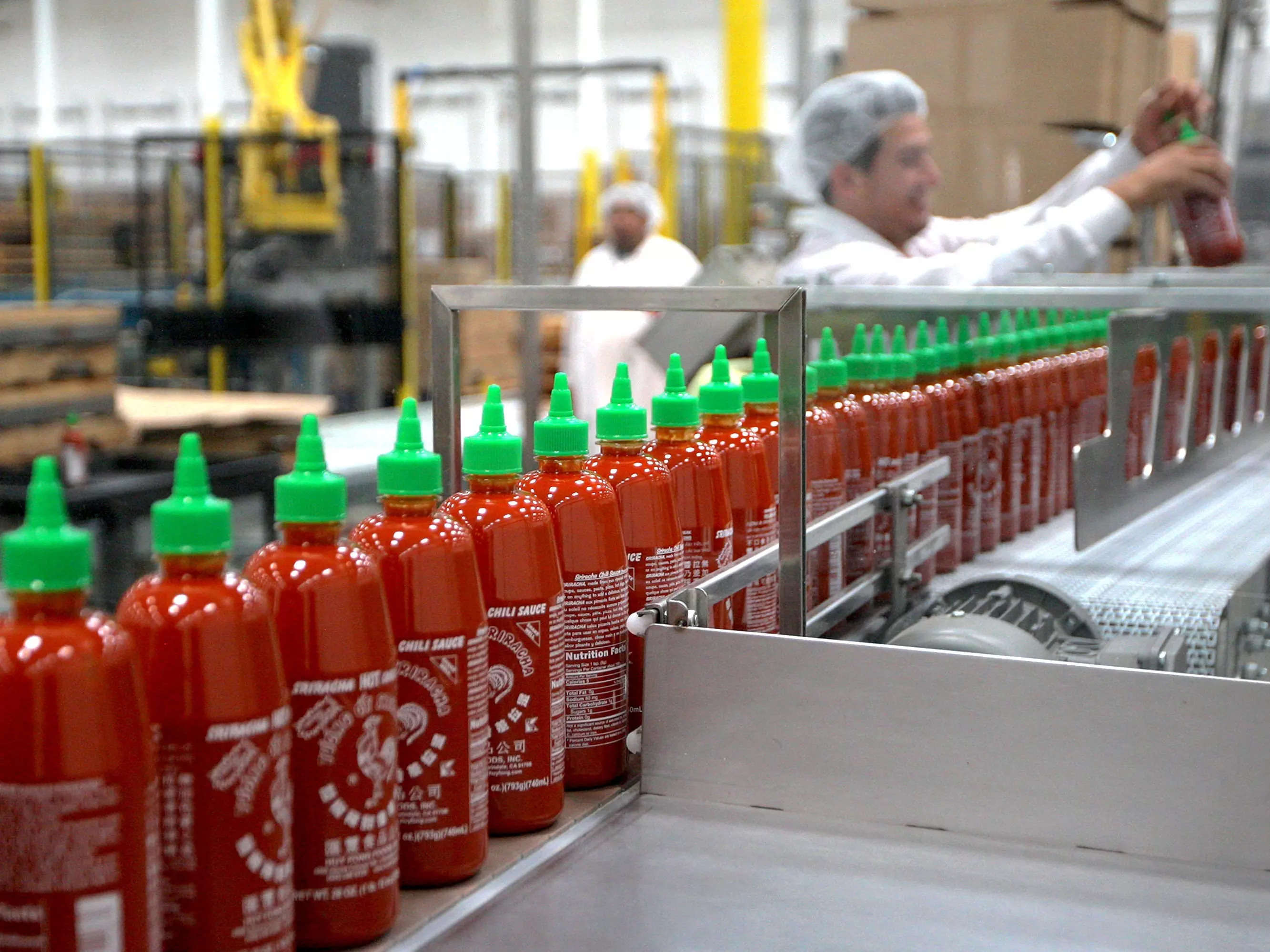 Sriracha Hot Chili Sauce is bottled at the Huy Fong Foods plant on May 14, 2014 in Irwindale, California.