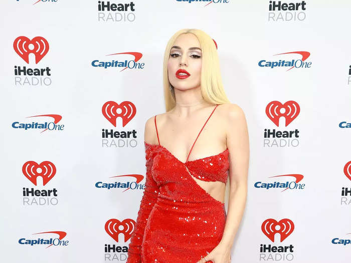 Ava Max embraced the Christmas spirit with a sparkling red dress.