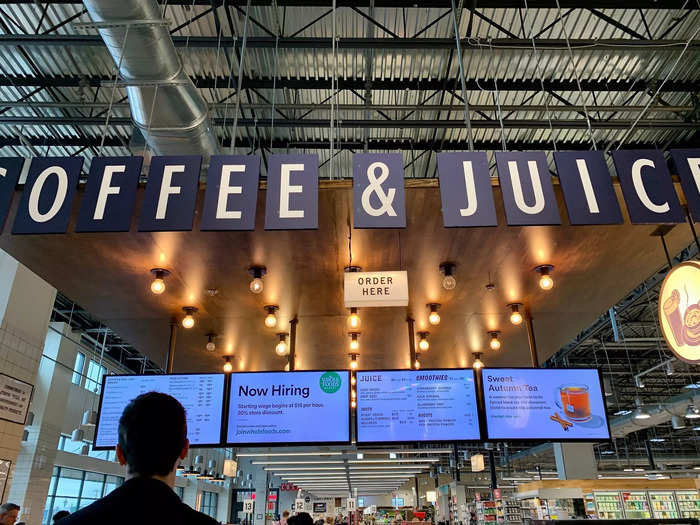 To get to the checkout at Whole Foods, you have to walk past a coffee and juice bar, while Wegmans