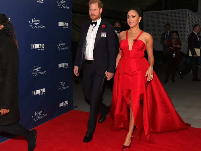 Meghan stunned in an all-red ensemble from head to toe at a gala in New York.