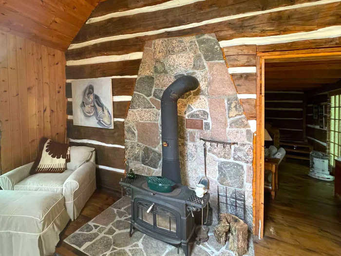 The sunroom is home to another wood stove …