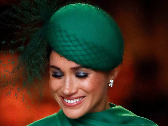 Meghan took her colorful look a step further with shimmery eyeshadow.