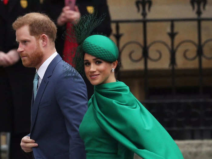 At their last royal engagement, Meghan wore another caped gown – this time in an emerald green color.