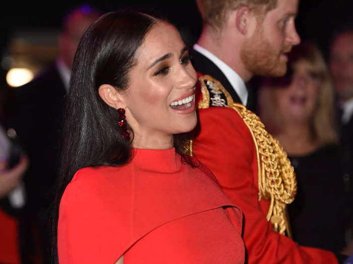 It may have been the penultimate event before stepping back from her royal duties, but Meghan appeared to be all smiles.