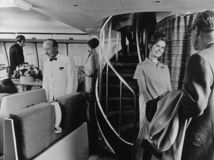 5: The double-decker plane featured bars and lounges on its upper level, which was accessed via a staircase.