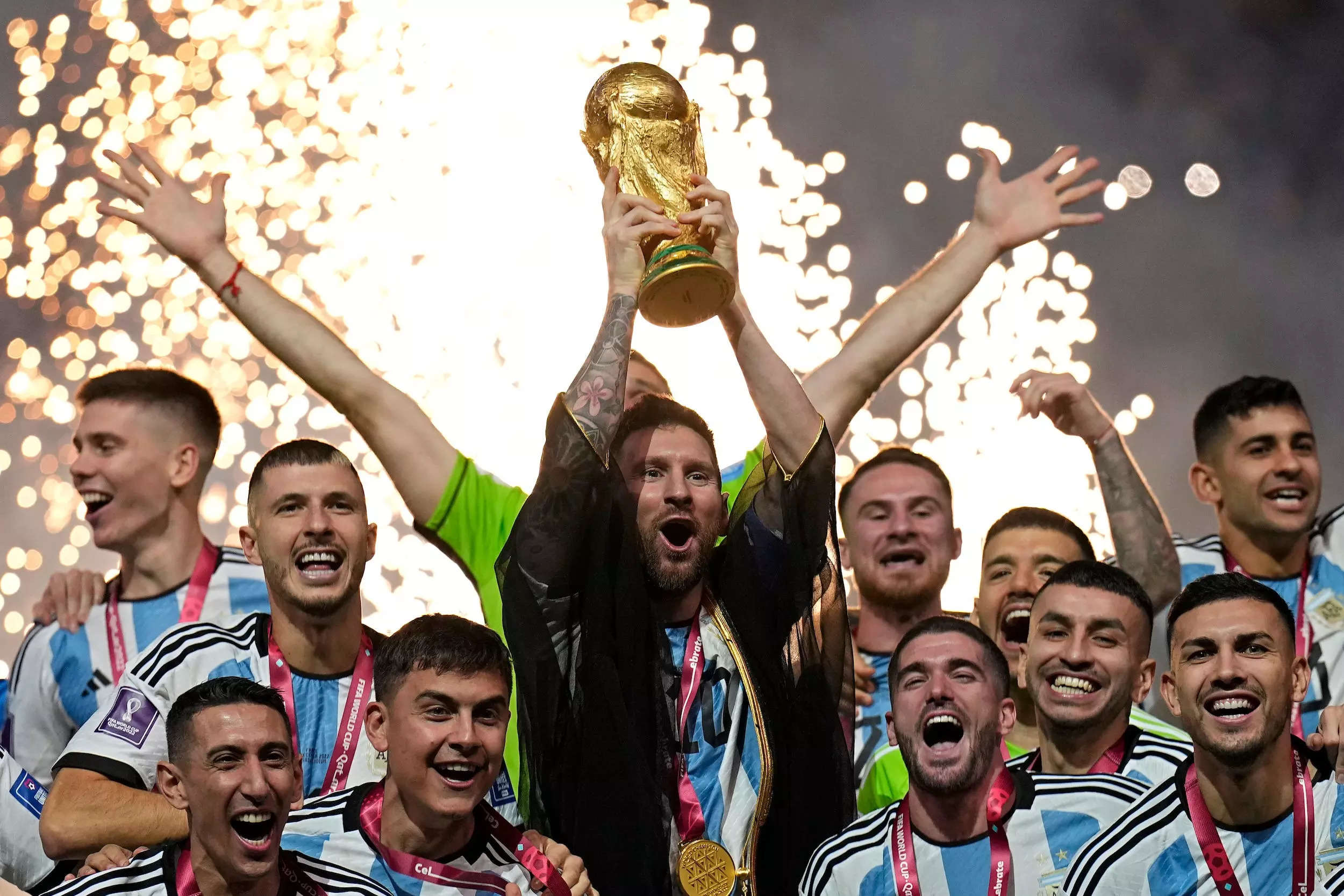 Lionel Messi lifts World Cup trophy for the first time.