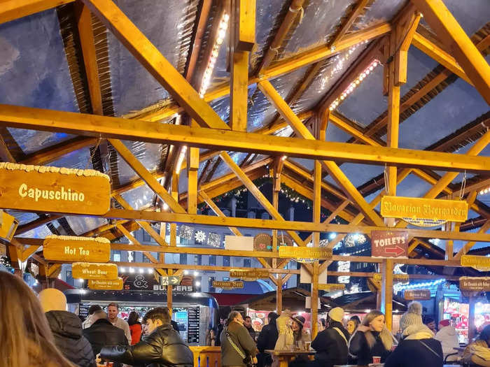 Once we finished checking out the vendor stalls, we found a beer garden within a gazebo where people enjoyed hot and cold beverages, and a musician serenaded people.