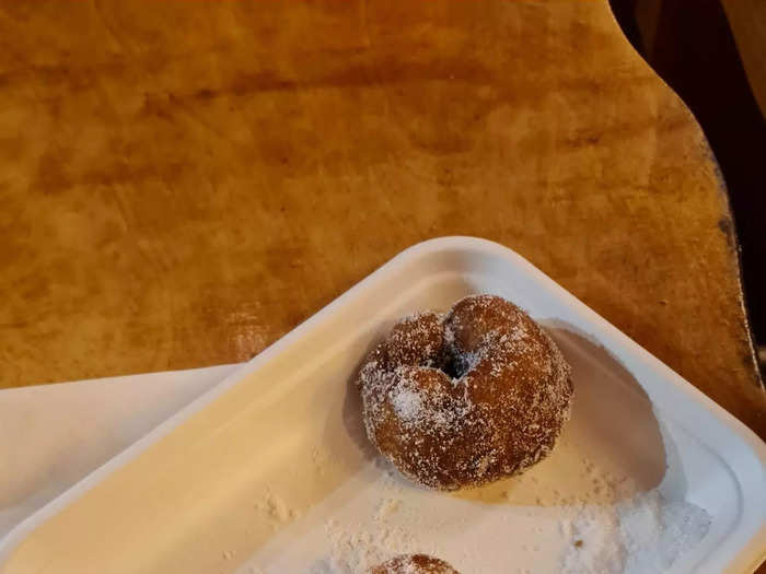 After roaming the market for a while, my friend and I snacked on a fresh box of donuts from a vendor, which cost £6, or around $7.35.