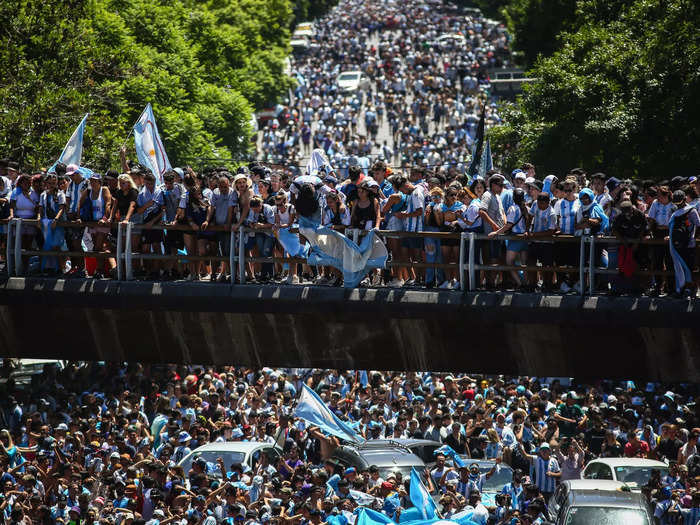 The fans stood where they could to get a glimpse of the team and celebrate the win.