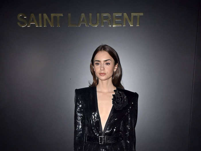 Collins donned a low-cut romper during Paris Fashion Week in 2020.